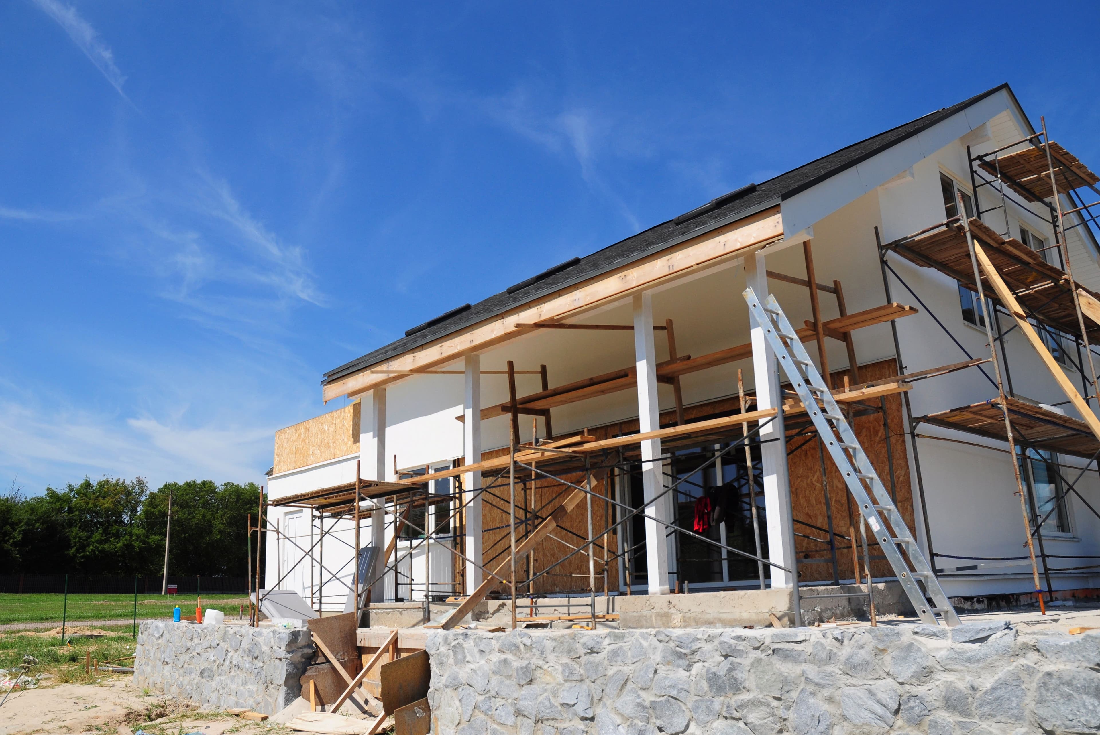 Renovate and repair residential house facade wall with mineral wool insulation