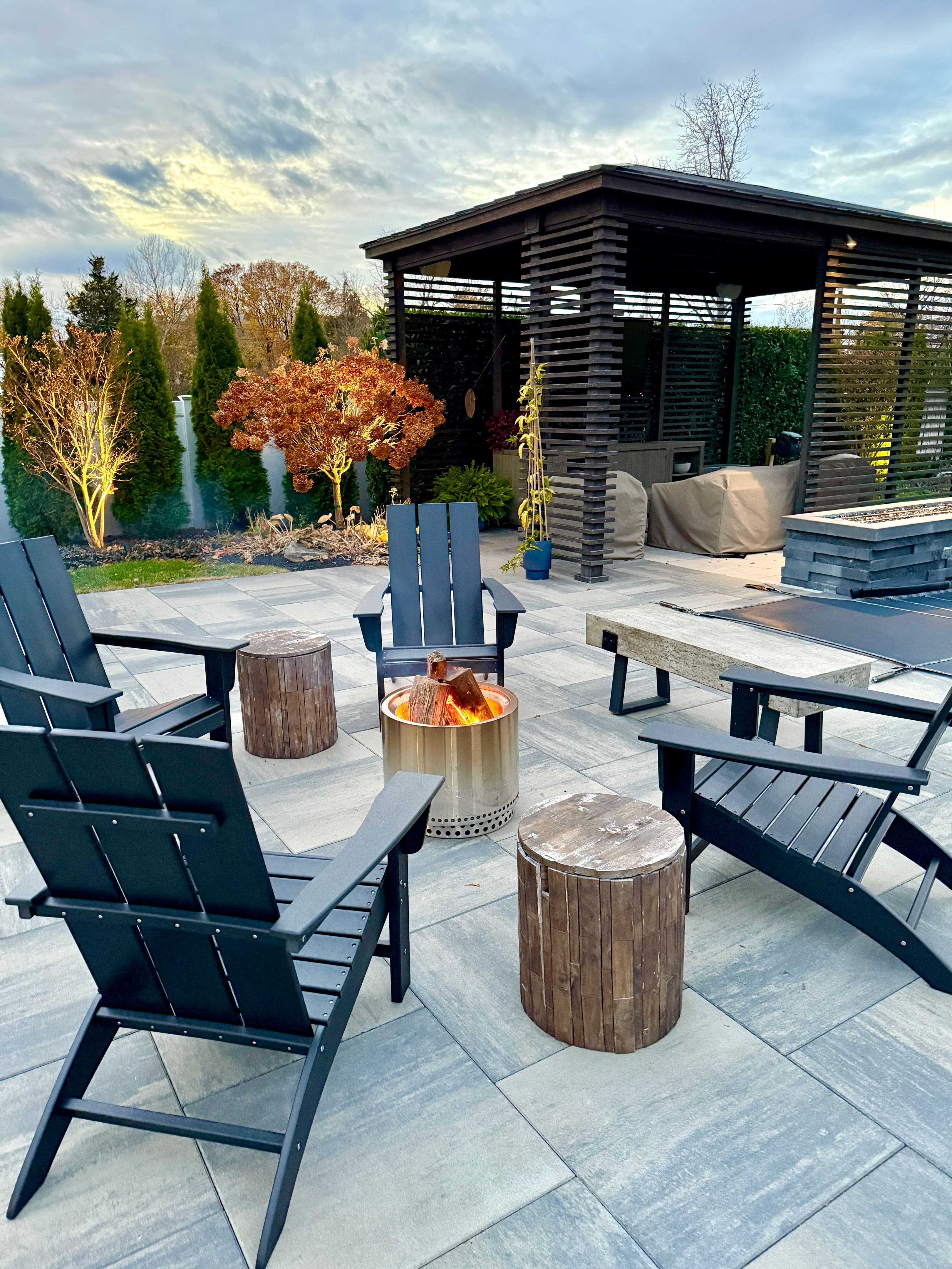 Outdoor sitting area fire pit in a chill backyard